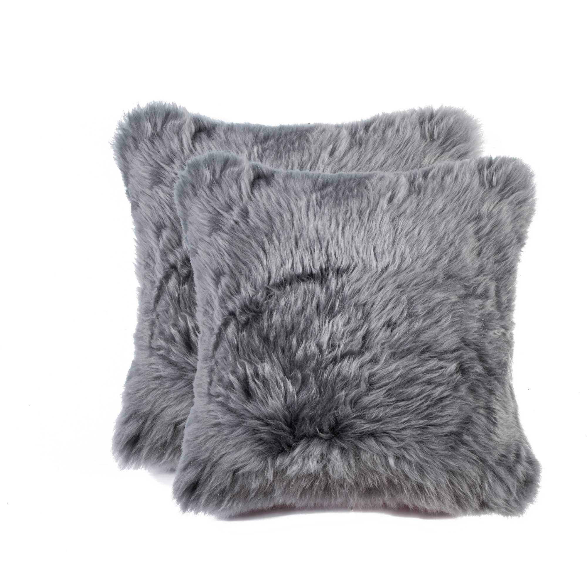 Two gray fluffy pillows on a white background