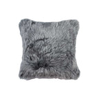 Gray faux fur pillow on a white background