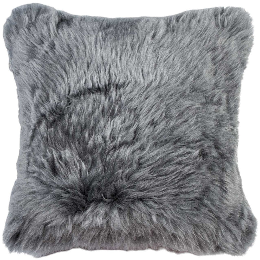 Gray fluffy pillow on a white background