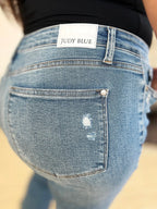 Judy Blue Mid-Rise Distressed Hem Jeans — Full Size - Whispering Desires Shoppe