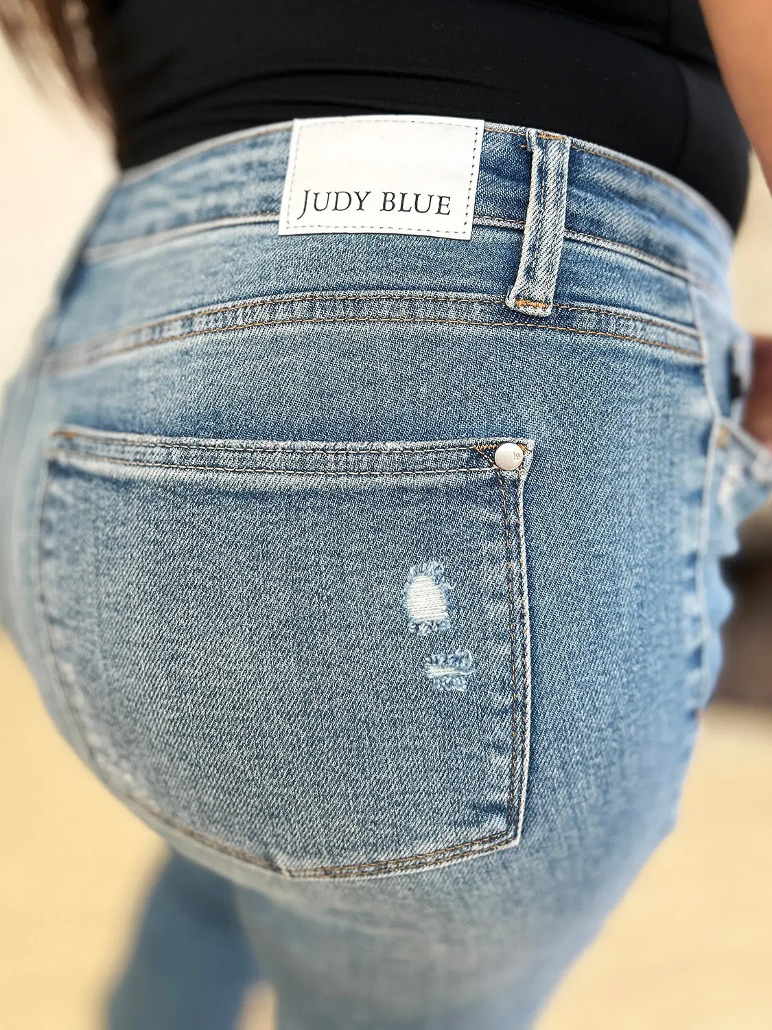 Judy Blue Mid-Rise Distressed Hem Jeans — Full Size - Whispering Desires Shoppe