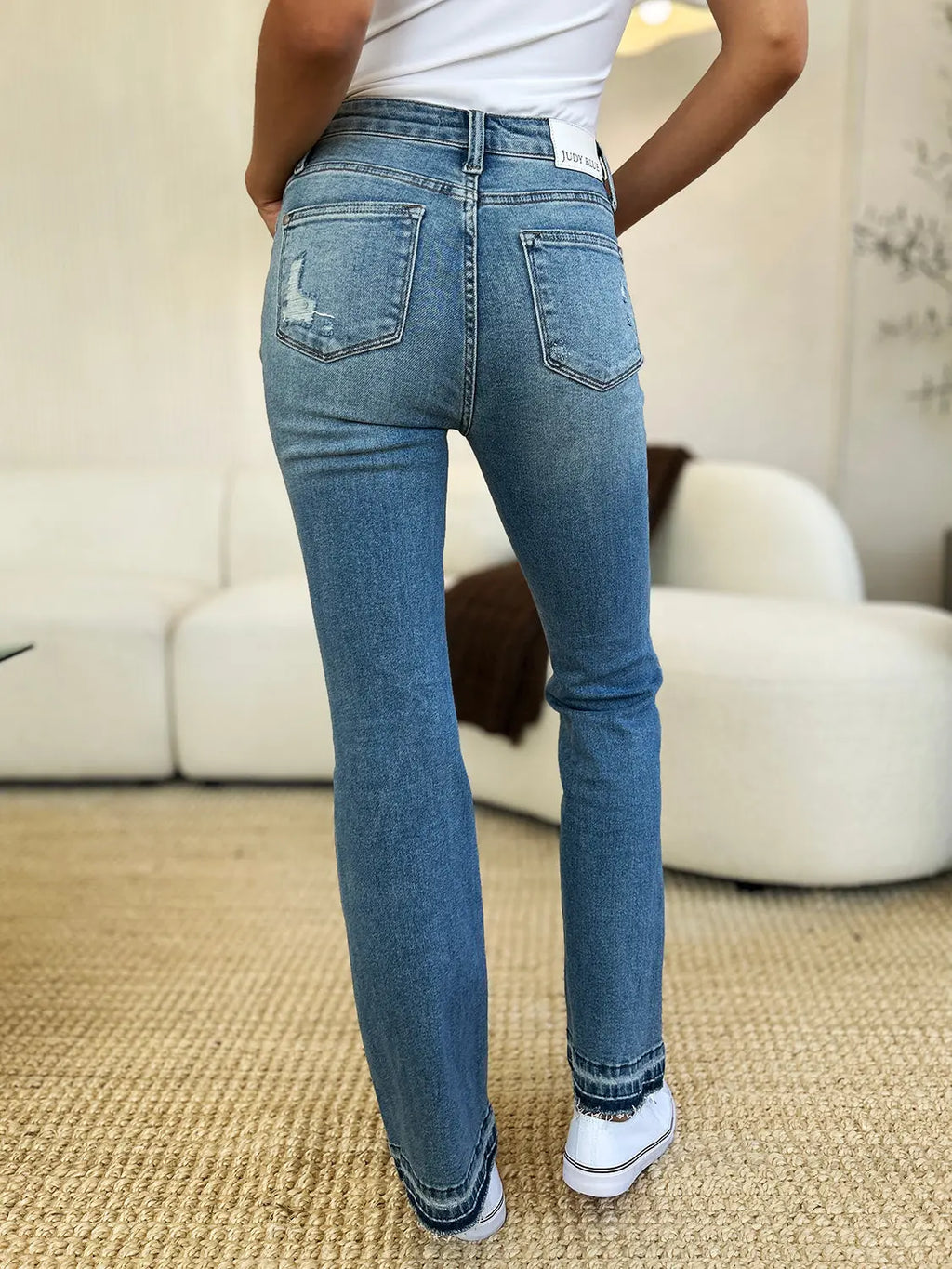 Judy Blue Mid-Rise Distressed Hem Jeans — Full Size - Whispering Desires Shoppe
